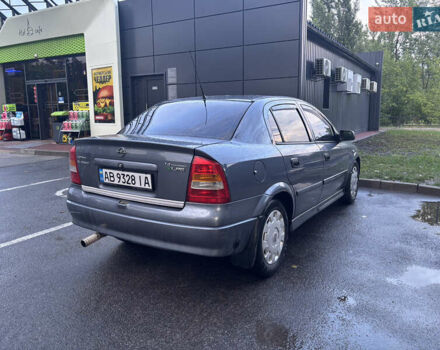 Серый Опель Астра, объемом двигателя 1.36 л и пробегом 332 тыс. км за 4200 $, фото 3 на Automoto.ua