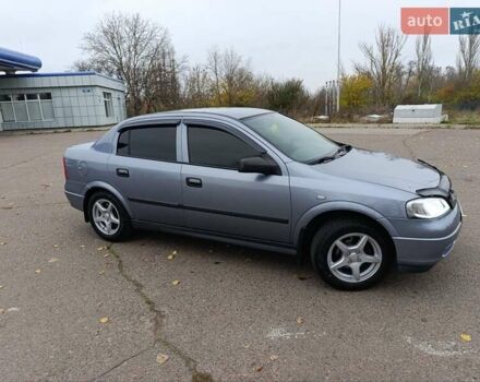 Серый Опель Астра, объемом двигателя 1.4 л и пробегом 77 тыс. км за 4400 $, фото 2 на Automoto.ua