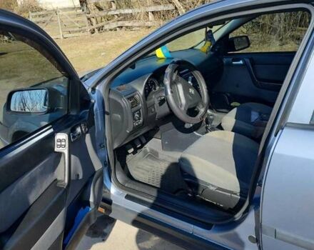 Серый Опель Астра, объемом двигателя 1.4 л и пробегом 213 тыс. км за 3700 $, фото 4 на Automoto.ua