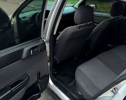 Серый Опель Астра, объемом двигателя 1.4 л и пробегом 201 тыс. км за 3450 $, фото 12 на Automoto.ua