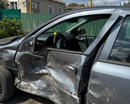 Серый Опель Астра, объемом двигателя 1.4 л и пробегом 122 тыс. км за 1500 $, фото 13 на Automoto.ua