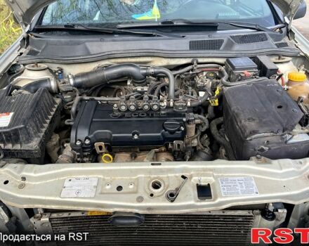 Серый Опель Астра, объемом двигателя 1.4 л и пробегом 326 тыс. км за 4200 $, фото 9 на Automoto.ua