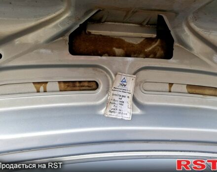 Серый Опель Астра, объемом двигателя 1.4 л и пробегом 183 тыс. км за 4200 $, фото 9 на Automoto.ua