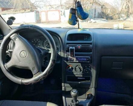 Серый Опель Астра, объемом двигателя 1.4 л и пробегом 213 тыс. км за 3700 $, фото 6 на Automoto.ua