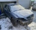 Серый Опель Астра, объемом двигателя 1.4 л и пробегом 250 тыс. км за 1299 $, фото 1 на Automoto.ua