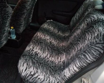 Серый Опель Астра, объемом двигателя 1.4 л и пробегом 119 тыс. км за 5000 $, фото 7 на Automoto.ua