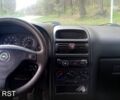 Серый Опель Астра, объемом двигателя 1.4 л и пробегом 451 тыс. км за 2300 $, фото 1 на Automoto.ua