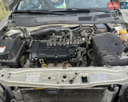 Серый Опель Астра, объемом двигателя 1.4 л и пробегом 326 тыс. км за 4200 $, фото 12 на Automoto.ua