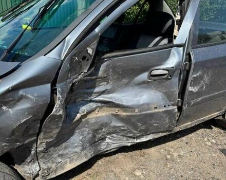 Серый Опель Астра, объемом двигателя 1.4 л и пробегом 122 тыс. км за 1500 $, фото 4 на Automoto.ua