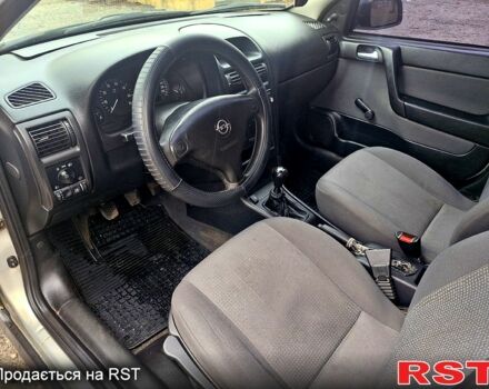 Серый Опель Астра, объемом двигателя 1.4 л и пробегом 183 тыс. км за 4200 $, фото 7 на Automoto.ua