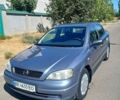 Серый Опель Астра, объемом двигателя 1.4 л и пробегом 73 тыс. км за 5100 $, фото 1 на Automoto.ua