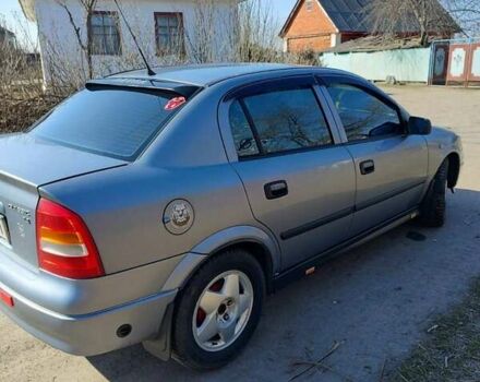 Серый Опель Астра, объемом двигателя 1.4 л и пробегом 213 тыс. км за 3700 $, фото 2 на Automoto.ua