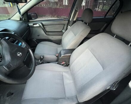 Серый Опель Астра, объемом двигателя 1.4 л и пробегом 158 тыс. км за 3250 $, фото 7 на Automoto.ua