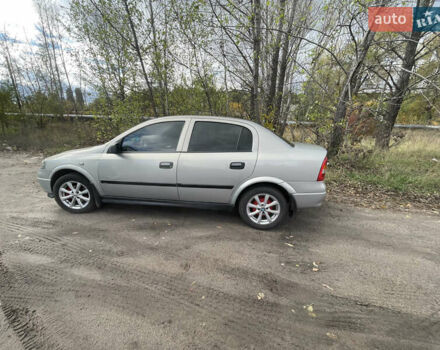 Серый Опель Астра, объемом двигателя 1.4 л и пробегом 326 тыс. км за 4200 $, фото 6 на Automoto.ua