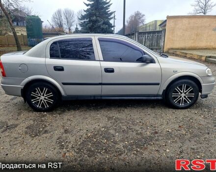 Серый Опель Астра, объемом двигателя 1.4 л и пробегом 183 тыс. км за 4200 $, фото 5 на Automoto.ua