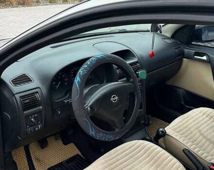 Серый Опель Астра, объемом двигателя 1.6 л и пробегом 179 тыс. км за 4000 $, фото 21 на Automoto.ua