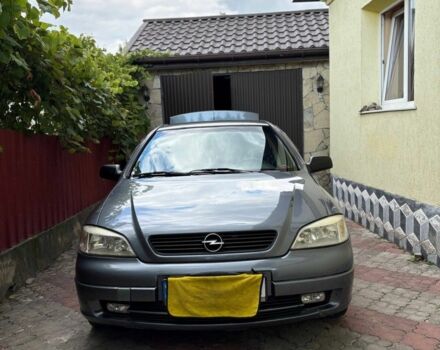 Серый Опель Астра, объемом двигателя 1.4 л и пробегом 201 тыс. км за 3600 $, фото 1 на Automoto.ua