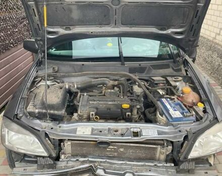 Серый Опель Астра, объемом двигателя 1.4 л и пробегом 122 тыс. км за 1500 $, фото 29 на Automoto.ua