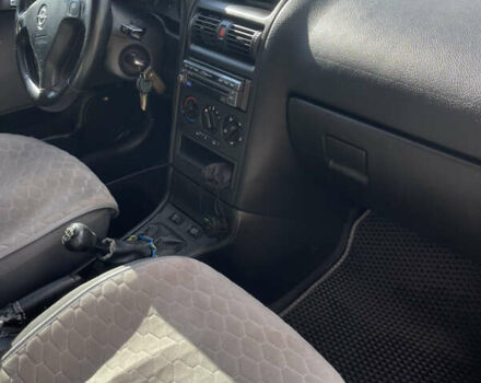 Серый Опель Астра, объемом двигателя 1.4 л и пробегом 326 тыс. км за 4200 $, фото 9 на Automoto.ua