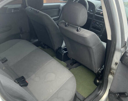 Серый Опель Астра, объемом двигателя 1.4 л и пробегом 104 тыс. км за 3900 $, фото 12 на Automoto.ua