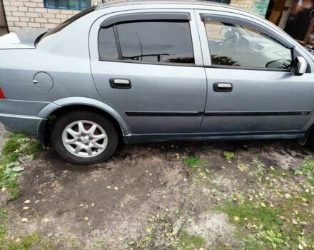 Серый Опель Астра, объемом двигателя 1.6 л и пробегом 256 тыс. км за 3500 $, фото 7 на Automoto.ua