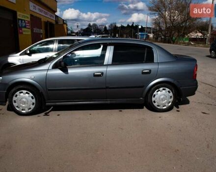 Серый Опель Астра, объемом двигателя 1.4 л и пробегом 150 тыс. км за 8000 $, фото 9 на Automoto.ua