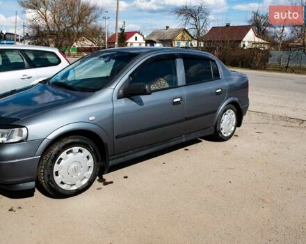 Серый Опель Астра, объемом двигателя 1.4 л и пробегом 150 тыс. км за 8000 $, фото 8 на Automoto.ua