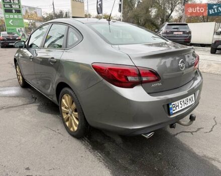 Серый Опель Астра, объемом двигателя 1.4 л и пробегом 92 тыс. км за 10999 $, фото 6 на Automoto.ua