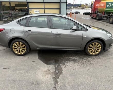 Серый Опель Астра, объемом двигателя 1.4 л и пробегом 92 тыс. км за 10999 $, фото 3 на Automoto.ua