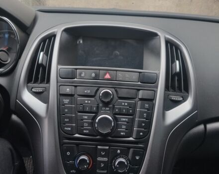 Серый Опель Астра, объемом двигателя 1.4 л и пробегом 15 тыс. км за 13100 $, фото 4 на Automoto.ua