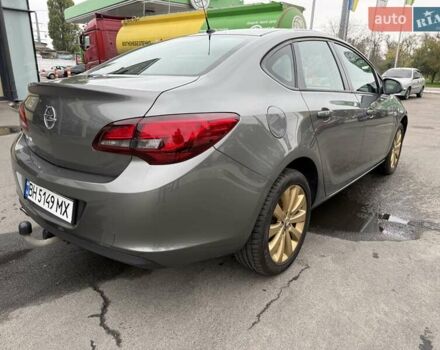 Серый Опель Астра, объемом двигателя 1.4 л и пробегом 92 тыс. км за 10999 $, фото 4 на Automoto.ua
