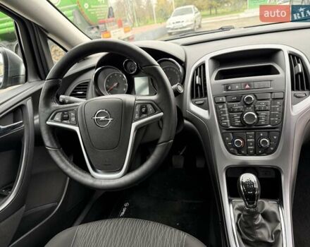 Серый Опель Астра, объемом двигателя 1.4 л и пробегом 92 тыс. км за 10999 $, фото 24 на Automoto.ua