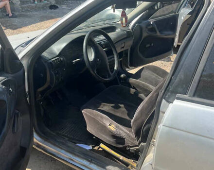 Серый Опель Астра, объемом двигателя 1.6 л и пробегом 100 тыс. км за 1100 $, фото 5 на Automoto.ua