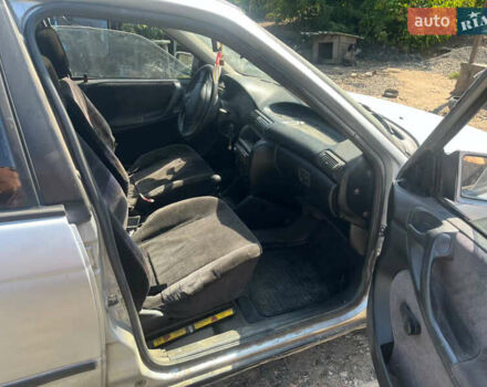 Серый Опель Астра, объемом двигателя 1.6 л и пробегом 100 тыс. км за 1100 $, фото 4 на Automoto.ua