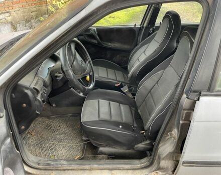 Серый Опель Астра, объемом двигателя 1.4 л и пробегом 350 тыс. км за 1200 $, фото 10 на Automoto.ua