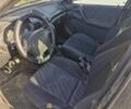 Сірий Опель Астра, об'ємом двигуна 1.4 л та пробігом 395 тис. км за 2000 $, фото 5 на Automoto.ua
