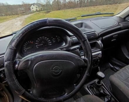 Серый Опель Астра, объемом двигателя 1.6 л и пробегом 290 тыс. км за 1184 $, фото 6 на Automoto.ua