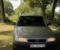 Серый Опель Астра, объемом двигателя 1.6 л и пробегом 295 тыс. км за 1600 $, фото 1 на Automoto.ua