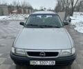 Серый Опель Астра, объемом двигателя 1.6 л и пробегом 295 тыс. км за 1600 $, фото 1 на Automoto.ua