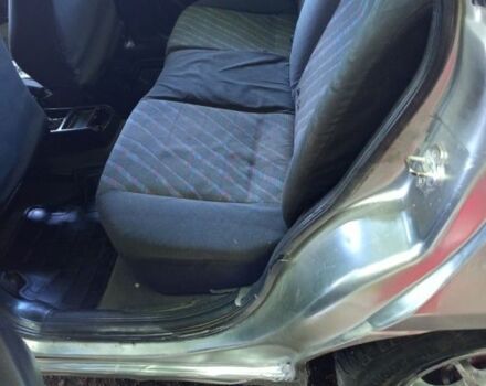 Серый Опель Астра, объемом двигателя 1.4 л и пробегом 39 тыс. км за 1400 $, фото 4 на Automoto.ua