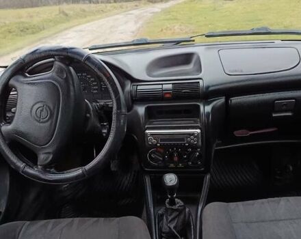 Серый Опель Астра, объемом двигателя 1.6 л и пробегом 290 тыс. км за 1200 $, фото 4 на Automoto.ua