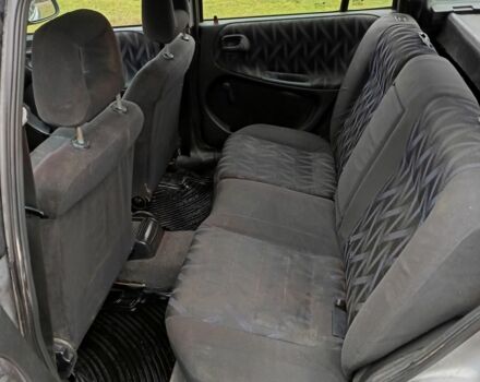 Серый Опель Астра, объемом двигателя 1.6 л и пробегом 290 тыс. км за 1184 $, фото 5 на Automoto.ua