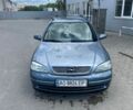 Серый Опель Астра, объемом двигателя 1.6 л и пробегом 100 тыс. км за 1990 $, фото 1 на Automoto.ua