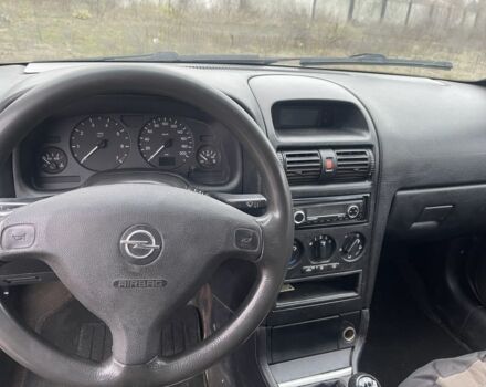 Серый Опель Астра, объемом двигателя 1.4 л и пробегом 250 тыс. км за 1900 $, фото 8 на Automoto.ua