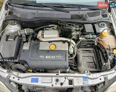 Серый Опель Астра, объемом двигателя 2 л и пробегом 350 тыс. км за 2400 $, фото 4 на Automoto.ua