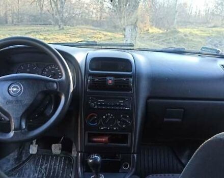 Серый Опель Астра, объемом двигателя 2 л и пробегом 300 тыс. км за 3000 $, фото 5 на Automoto.ua