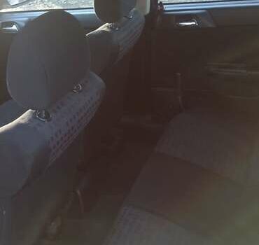 Серый Опель Астра, объемом двигателя 2 л и пробегом 300 тыс. км за 3000 $, фото 7 на Automoto.ua