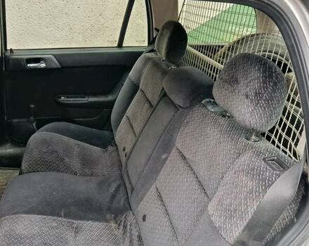 Серый Опель Астра, объемом двигателя 2 л и пробегом 350 тыс. км за 2400 $, фото 6 на Automoto.ua