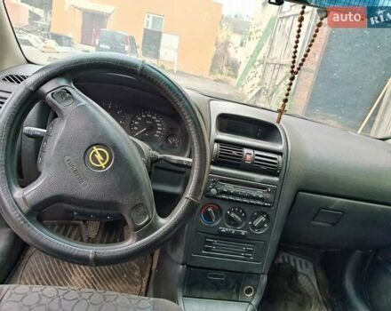 Серый Опель Астра, объемом двигателя 2 л и пробегом 350 тыс. км за 2400 $, фото 8 на Automoto.ua