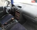 Серый Опель Астра, объемом двигателя 2 л и пробегом 350 тыс. км за 800 $, фото 4 на Automoto.ua